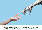 Female human hand and robot's...