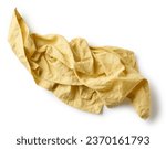 yellow crumpled cotton napkin isolated on white background, top view