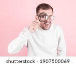 Shocked man with glasses with a ...