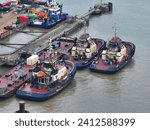 Small photo of Svitzer Tugs, Sheerness, Kent, UK - 14 Jan 2024 from left clockwise Svitzer Ramsey, Ganges and Monarch awaiting their next job in Sheerness