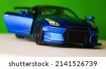 Realistic Blue Toy Sport Car  