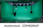 Empty green screen studio with...