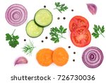 tomato, cucumber and carrot slice with parsley leaves, dill, onion, garlic isolated on white background. Top view