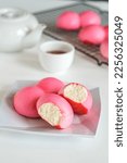 Small photo of Pink steamed bun. The traditional chinese steamed cake " Mi ku" is an importat cake during praying ceremonies as offerings to Chinese Gods. Selective focus.