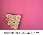 Small photo of corn tortilla chips isolated on a pink red background (cut out masa chip for dipping) restaurant style crunchy toasted yellow, white nixtamalized hominy (mexican food, totopos)