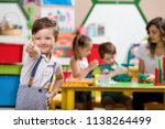 Preschool Children and Teacher in Classroom