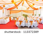 An image of tables setting at a ...