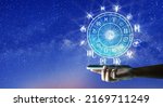 Small photo of Astrological zodiac signs inside of horoscope circle on Mobile Technology. Astrology, knowledge of stars in the sky over the milky way and moon. Zodiac internet online concept.