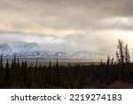 Small photo of The Alaska Highway through Canada and the United States--including mountains, moose, bison, quaint towns, kitsch, landscapes--in spring.