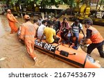 Small photo of National Disaster Respond Force (NDRF ) rescued people from the flooded areas after heavy rain in Guwahati Assam India on Tuesday 14th June 2022.