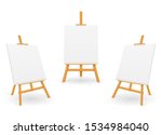 Wooden easel for painting and drawing with a blank sheet of pape