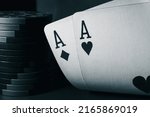 A pair of aces and poker chips  ...