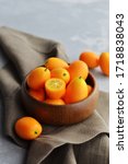 Citrus Kumquat Fruits In Wooden ...