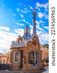 Small photo of Fairytale gingerbread house in Park Guell designed by Antoni in Barcelona, Spain