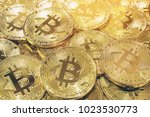 Bitcoin Cryptocurrency pile background - Bitcoin is a new currency that was created in 2009 by an unknown person. It can be used to buy merchandise anonymously.