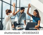 Small photo of Group of happy businesspeople celebrate their successful project. Professional business team win and proud of their project at modern office. Successful teamwork, happy colleague, workplace. Tracery.