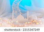 Small photo of Beautiful mosque with crescent moon shape Eid Al Adha image, hijri new year background
