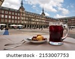 Small photo of Tinto de verano accompanied by some patatas bravas in the Plaza Mayor in Madrid Spain