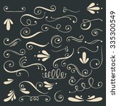set of hand drawn swirls.... | Shutterstock .eps vector #335300549