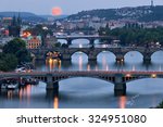 Prague Cityscape And Full Moon  ...