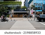 Small photo of Jakarta, Indonesia - July 17th, 2022: An iconic zebra cross or crossing walk in SCBD Sudirman. It is becoming very popular due to Citayam Fashion Week phenomenon.