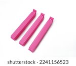 Composition of pink plastic...