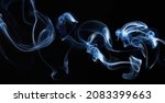 Small photo of blue smoke on black background with abstract blur motion wave swirl . Wisp of Smoke. Cigarette smoke waves and clouds texture