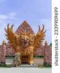Small photo of Statue of a Winged Lion,View of the Ambara Raja Lion Statue in Buleleng Bali, this is a statue of a winged lion holding a bunch of corn which symbolizes the strength, chivalry, and supernatural powers