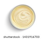 Small photo of Bowl of condensed milk cream isolated on white background with clipping path, top view