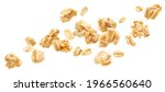 Falling oat granola, crunchy muesli isolated on white background