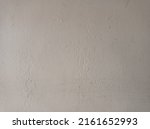 Small photo of Abstract uneventful painting wall light brown