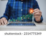 Display stock market charts. Business hand working with stock market investment use tablet. Investment growth The growing power of the compound interest concept. success wealth stock investment.