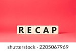 Small photo of Recap symbol. Wooden cubes with word Recap. Beautiful red background. Recap concept. Copy space.