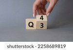 Small photo of From 3rd Quarter to 4th symbol. Businessman hand Turnes cube and changes words 3rd Quarter to 4th Quarter. Beautiful grey background. Business and Quarter concept. Copy space