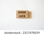 Small photo of Good luck symbol. Wooden blocks with words Good luck. Beautiful white background. Business and Good luck concept. Copy space.