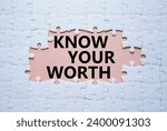 Small photo of Know your worth symbol. Concept words Know your worth on white puzzle. Beautiful pink background. Business and Know your worth concept. Copy space.