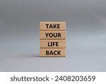 Small photo of Learn to react Less symbol. Wooden blocks with words Learn to react Less. Beautiful grey background. Business and Learn to react Less. Copy space.