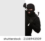 Thief In Mask With Crowbar On...