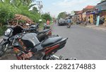Small photo of cupel March 30, 2023, motorbikes are parked on the side of the road