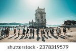 Small photo of Lisbon, Portugal - 03.10.2023: People waiting in line at Belem Tower aka Torre de Belem aka Torre de Sao Vicente on a sunny summer day. UNESCO World Heritage site portuguese capital landmark.