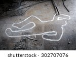 Crime scene chalk outline of a dead body