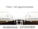 New year motivational message 1 year = 365 opportunities typed on retro typewriter.