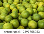 Small photo of Green tangerine unripe green tangerine, green tangerine, tangerine many fruits