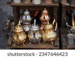 Vintage Turkish teapots souvenir on the counter in Turkey