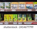 Small photo of PENANG, MALAYSIA - 1 DEC 2023: An array of Japanese premium tea brands is displayed on the store shelves. These teas, often consumed for their perceived health benefits.