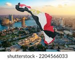 Small photo of Cairo from an upper perspective and the Egyptian flag flutters in the sky, Cairo, Egypt
