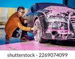 Car washing car in a self-service car wash station. Car wash self-service.