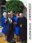 Small photo of Washington DC. USA, October 18, 1991 Judge Clarence Thomas is sworn as Associate Justice of the United States Supreme Court by Justice Bryon White at White House as his wife Virginia holds the Bible