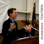 Small photo of Emporia, Kansas, USA, 8th April, 2015 Kansas Governor Sam Brownback with Hostess Brands Chairman Dean Metropoulos today at the Hostess Twinkie plant in Empoira.