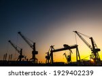 Silhouettes Of Harbor Cranes At ...
